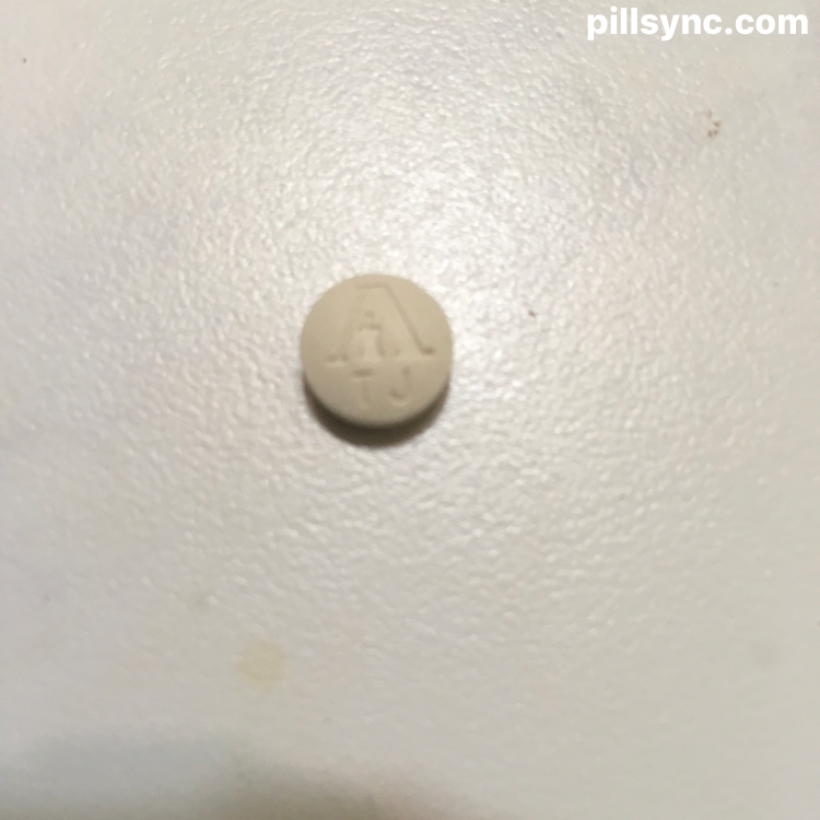 A TJ ROUND BROWN armour thyroid (thyroid, porcine) tablet allergan